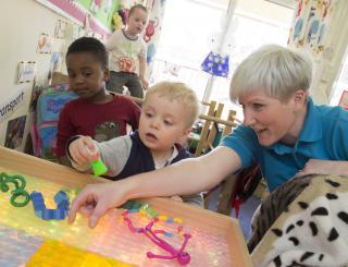 Teacher with pupils